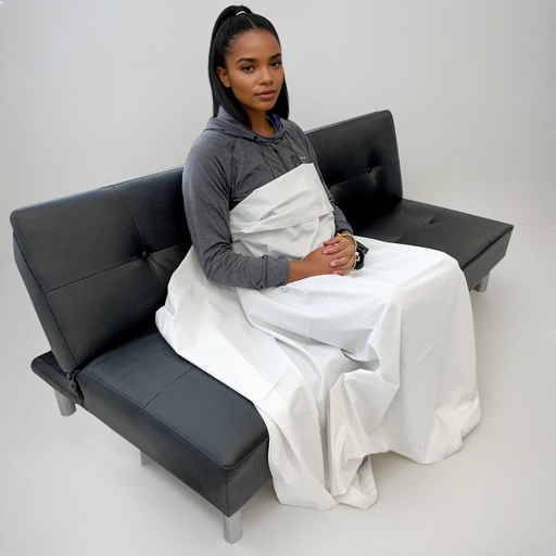 Female model demonstrating the WOREMOR® Earthing Blanket ESB for low frequency EMF protection