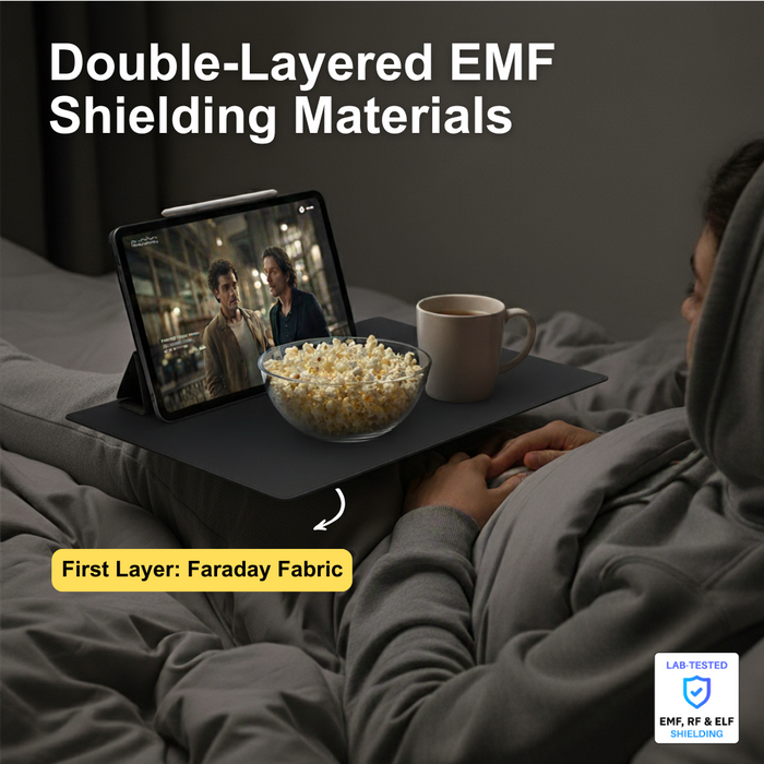 iPad placed on EMF shielding laptop tray while watching a movie