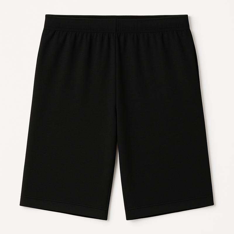 Black EMF shielding shorts laid flat on a neutral background, highlighting sleek design, soft stretch fabric, and low-profile seams for everyday comfort and protection
