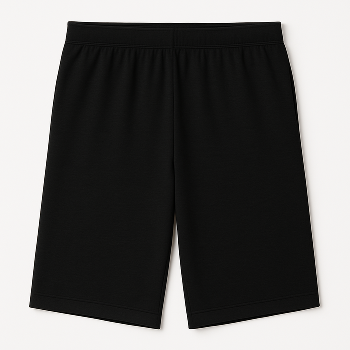 Black EMF shielding shorts laid flat on a neutral background, highlighting sleek design, soft stretch fabric, and low-profile seams for everyday comfort and protection