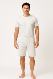 Birch white EMF shielding shorts on model, featuring mid-thigh length and soft stretch waistband for comfort and low-profile protection