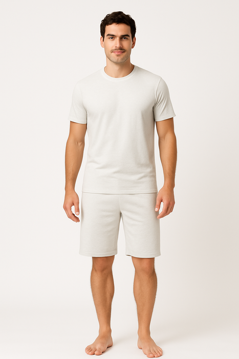 Birch white EMF shielding shorts on model, featuring mid-thigh length and soft stretch waistband for comfort and low-profile protection
