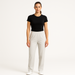 Model wearing women's EMF and 5G shielding pants in birch