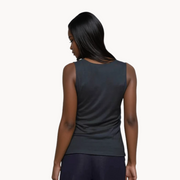 Back view of women's EMF and 5G shielding tank top in black on model