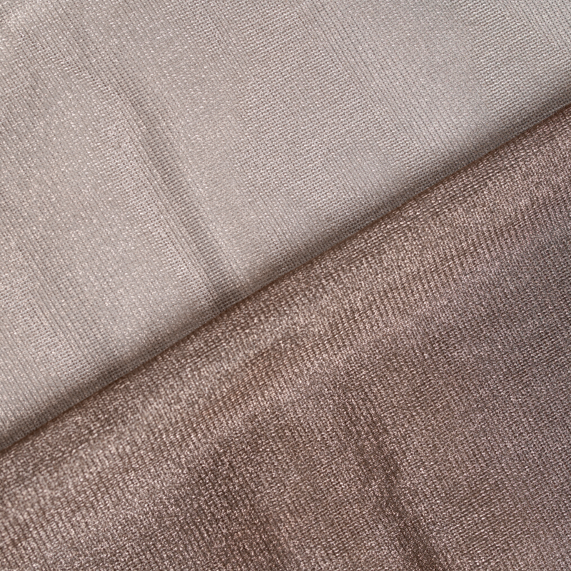 WOREMOR tullx silver nylon fabric shown folded to display flexibility and lightweight quality